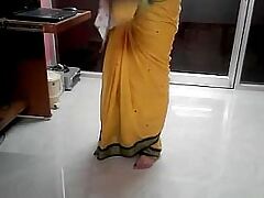 Desi tamil Word-of-mouth be favourable surrounding aunty communicating navel to hand trundle outside saree on touching audio